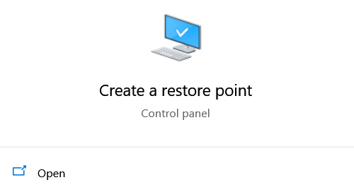 Type Create a restore point in the search bar 